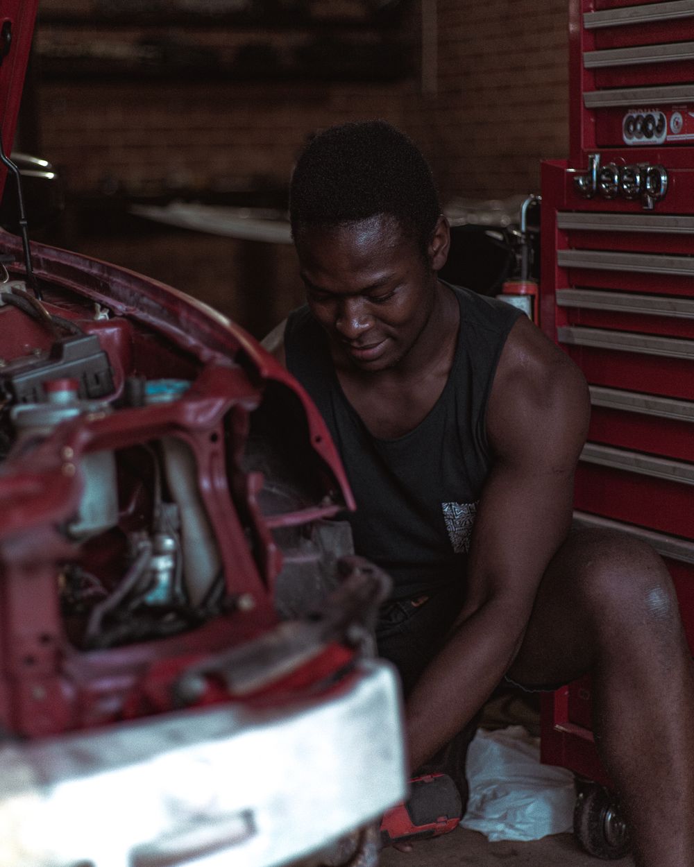 A young mechanic ready to offer a human second opinion